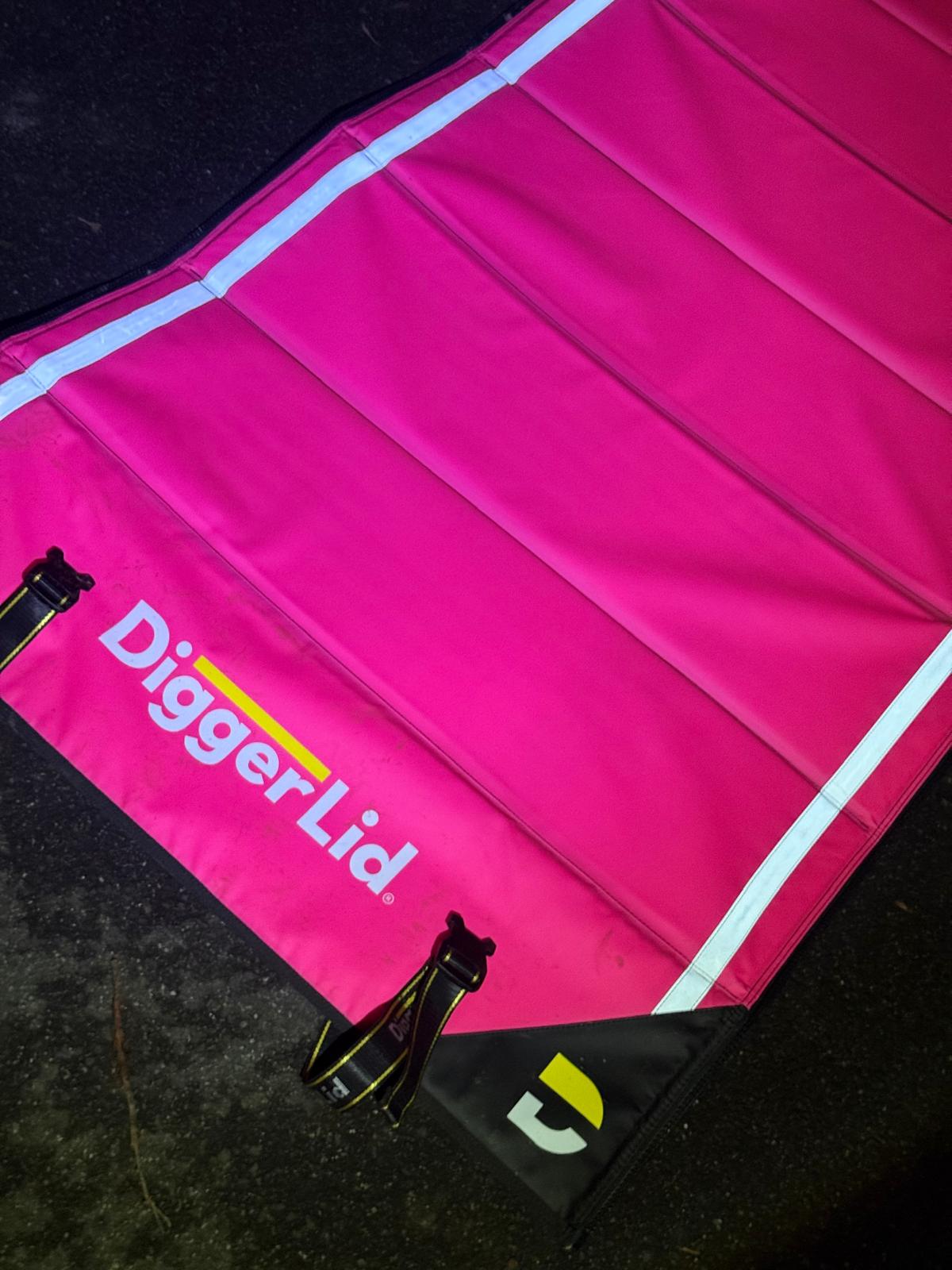 Close-up of a Safety Orange Pro Mat Plus showing the sewn-in reflective panels