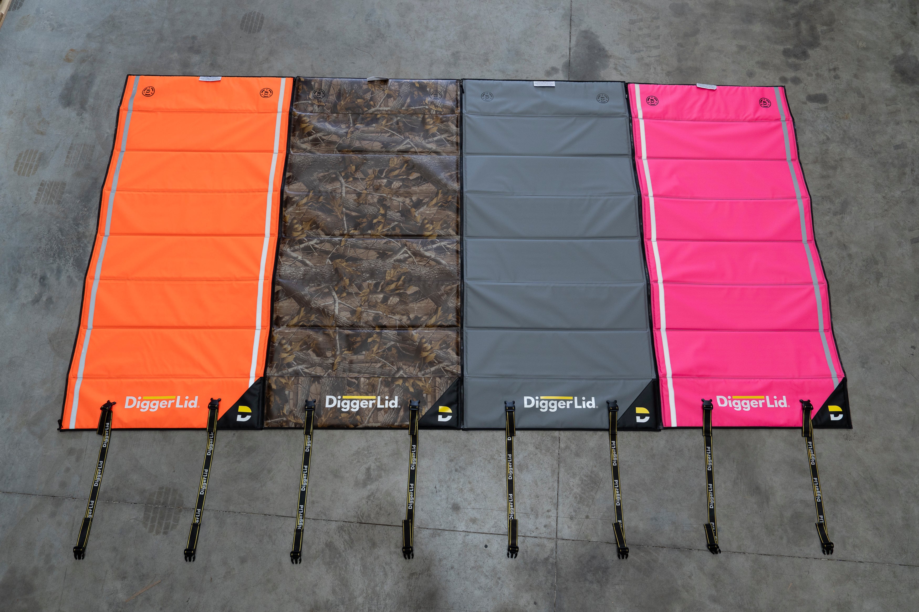 Overhead flat lay of all four Pro Mat Plus colours side by side