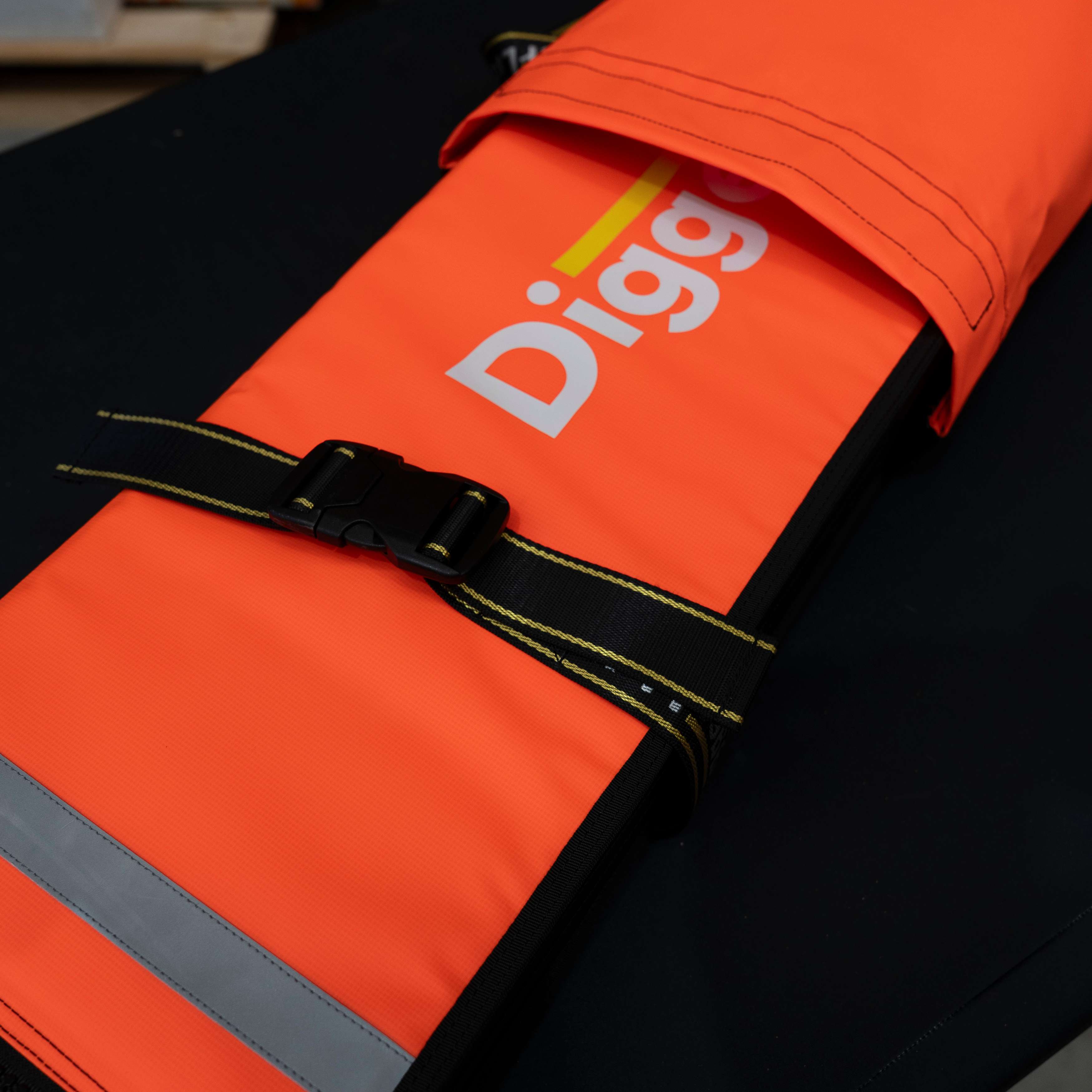 Two Pro Mat Plus mats rolled and strapped