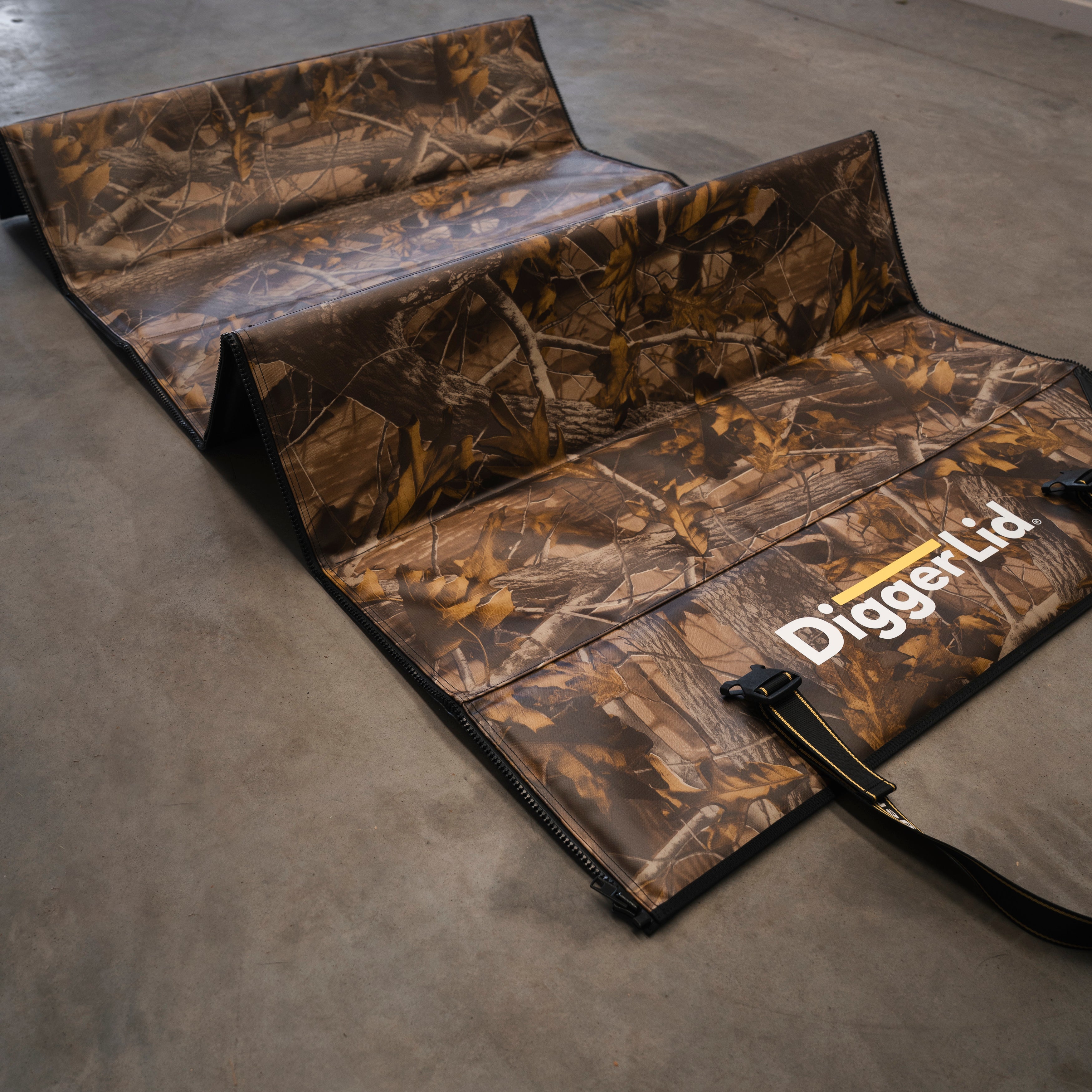 High Country Camo Pro Mat Plus folded, showing the moulded zips, magnets and accordion fold